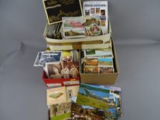 Large quantity of vintage postcards and other ephemera contained within three boxes