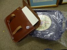 Leather music sheet carry case and a padded knee tray