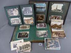 Collection of four hundred plus vintage postcards and photographs contained in three albums and