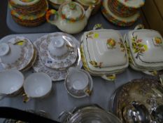 Two crescent ivory berry decorated lidded tureens and a quantity of Staffs teaware