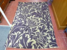 Modern deep pile rug with thistle design