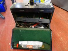 Black wooden toolbox with initials 'K N B' with contents