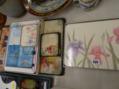 Quantity of boxed placemats and coasters