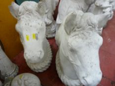 Pair of horse head garden ornaments