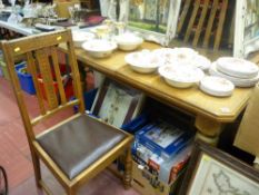 Circa 1900 oak extending dining table with cut off corners and one extra leaf with a set of six (