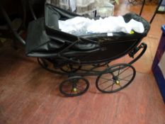 Hooded doll's pram with white silk covers etc