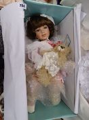 Doll in wedding style outfit with soft toy accompaniment (boxed)