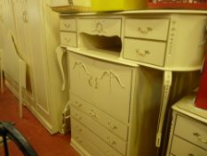 Cream French/Continental bedroom suite of twin wardrobes, dressing table and chest of drawers