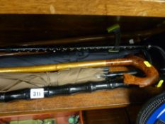 Parcel of canes, umbrellas etc