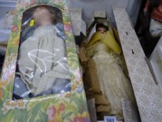 Doll with delicate yellow silk dress and pearls etc (boxed) and a Knightsbridge Collection porcelain