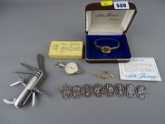 Boxed Seth Thomas lady's wristwatch and strap, a boxed map measuring tool, a multi-function pocket