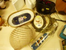 Parcel of ornamental items including a German trinket tray, shelf, ship in bottle, binoculars etc