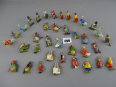 Vintage Bourneville biscuit tin contained in a quantity of metal painted animal figurines