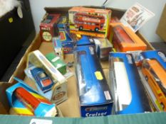 Box of bubble packed diecast vehicle and others