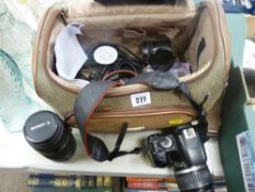 Canon Eos digital camera with charger and extra lenses in a bag etc