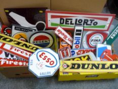 Two boxes of motoring accessories brand names, advertising signs - NGK, Firestone, BP, Total etc