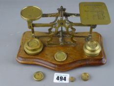 Set of vintage postal scales with weights