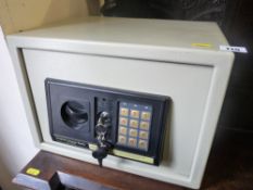 Small digital home safe with key