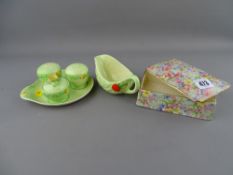 Royal Winton chintz decorated box and cover, a Carltonware cruet set and a jug