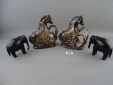 Pair of ebony elephants and a pair of Victorian pottery horses