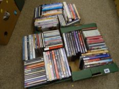Three small boxes of music CDs and DVDs