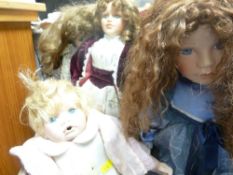 Quantity of ornamental dolls on stands