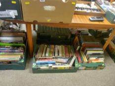 Four boxes of mixed books