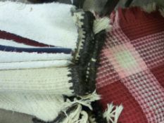 Waffle blanket and quantity of rugs