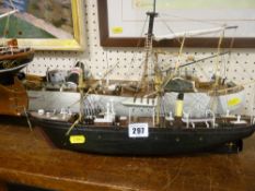 Model boat with kit and a model fishing boat