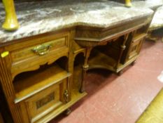 Marble topped (A/F) light wood breakfront sideboard base with carved lower panelled doors