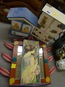 Two painted wooden storage containers, a wall mirror and a composite wall plaque after MUCHA