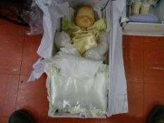 Sleeping boy doll with cream/yellow silk dress and pillow (boxed)