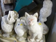 Three rabbits and an owl and pussycat garden ornaments