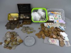 Large quantity of vintage coinage, British and overseas and a small tub of unsorted stamps