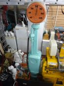 Ornamental vintage petrol pump with temperature gauge dial and interchangeable total pillar globe