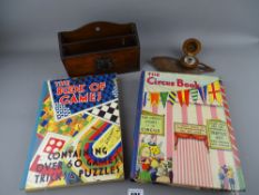 Two boxed children's books, small oak letter rack and a carved wood fruit and leaf inkwell
