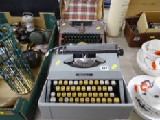Two cased vintage typewriters by Imperial and Oliver