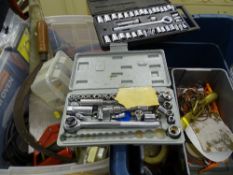 Two tubs containing miscellaneous fixings, screws, hooks, spoke shave and two handsaws, small socket