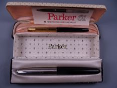 Vintage black Parker 61 fountain pen with rainbow RG cap, in original box with instructions and a