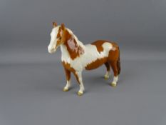 A BESWICK SKEWBALD PINTO PONY, 16.5 cms high