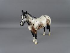 A BESWICK APPALOOSA STALLION, 20 cms high overall