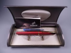 Modern (2001 - 2004) Sunny red Parker Inflection fountain pen with gold plated trim and stainless