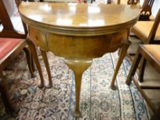 A MAHOGANY HALF MOON FOLDOVER TABLE with small 2 drawers