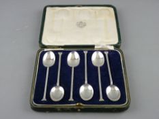 A CASED SET OF SIX PLAIN SILVER COFFEE SPOONS with spade handles, the case labelled 'Inglis &