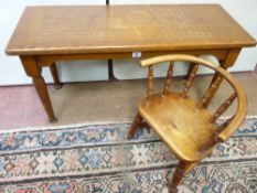 A CHILD'S SPINDLEBACK ARMCHAIR and a rectangular oak side table