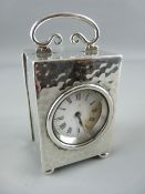 A SILVER CASED MINUET CARRIAGE CLOCK, London 1905, French brass movement with captive winder, 8.75