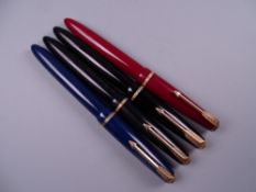 Four Vintage Parker Slimfold fountain pens (two black, one blue, one red), all with 14k nibs