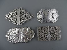FOUR ORNATE SILVER NURSE'S BUCKLES, Birmingham hallmarks, various dates including 1909 Deacon &