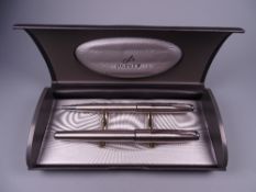 Modern brushed steel Parker Sonnet Flighter fountain pen and ballpoint pen set with chrome trim,