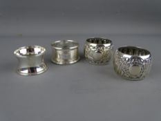 FOUR SILVER NAPKIN RINGS, 2.3 troy ozs gross